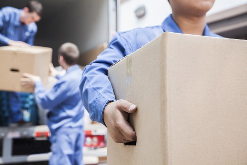 Removal company loading items for a home move