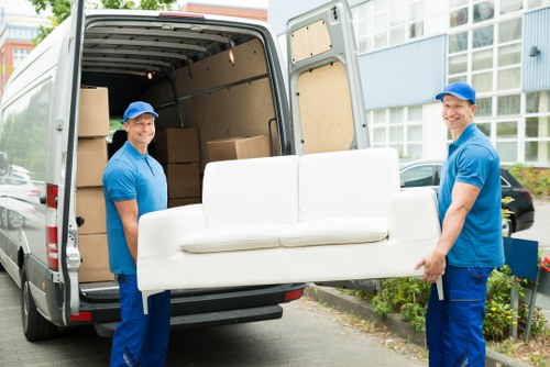 Van and moving helper in a London residential street