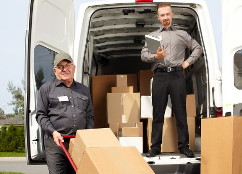 Local removals team handling a London property move with careful loading