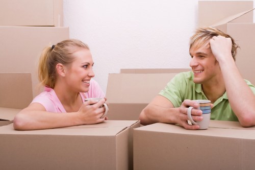 Moving van and packed boxes for a London house move