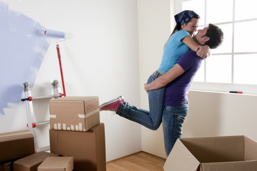 London man and van service unloading household items at a property