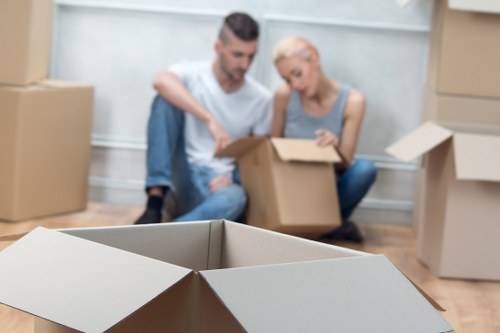 Loading furniture into a truck during a London relocation