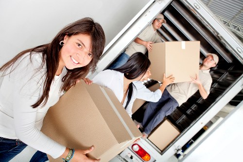 Packed boxes and furniture ready for house removals in London