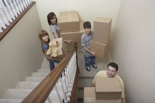 Commercial relocation scene with office equipment and moving trolley
